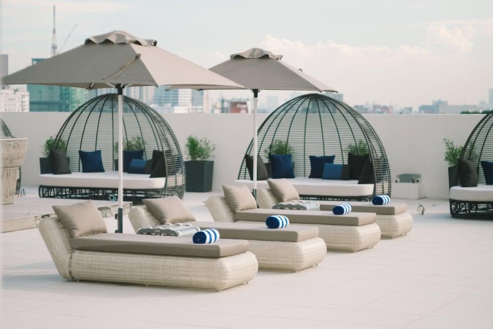 فندق سيدا، فيرتيس نورث كويزون سيتي المظهر الخارجي الصورة The rooftop pool at the hotel