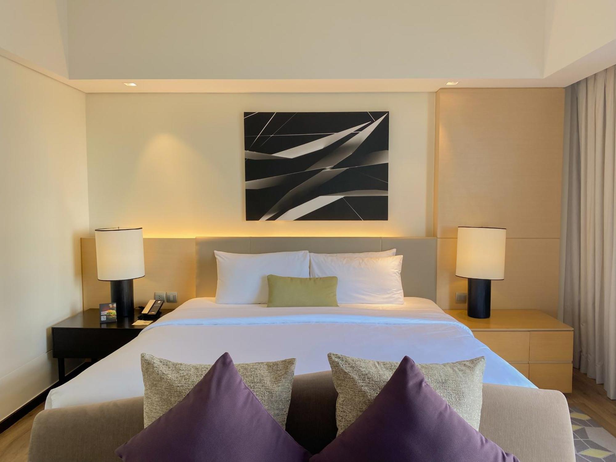فندق سيدا، فيرتيس نورث كويزون سيتي المظهر الخارجي الصورة A bedroom at the hotel