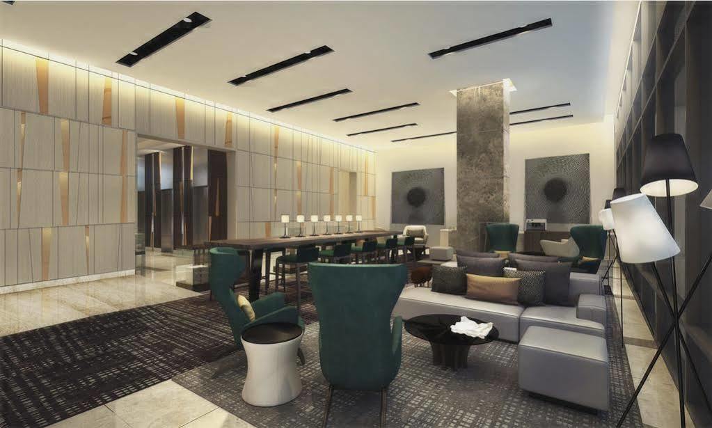 فندق سيدا، فيرتيس نورث كويزون سيتي المظهر الخارجي الصورة The lobby of the hotel