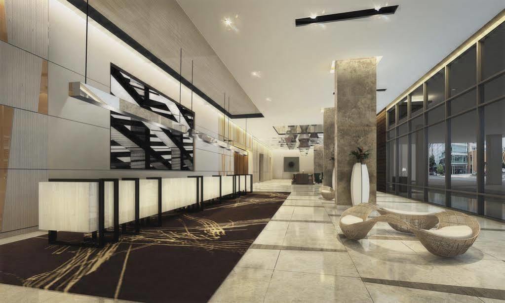 فندق سيدا، فيرتيس نورث كويزون سيتي المظهر الخارجي الصورة The lobby of the hotel